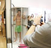 Models take a shower in public with a Sony Xperia Z