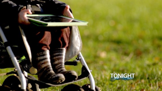 A young tablet user on the move Photo: ITV / Tonight
