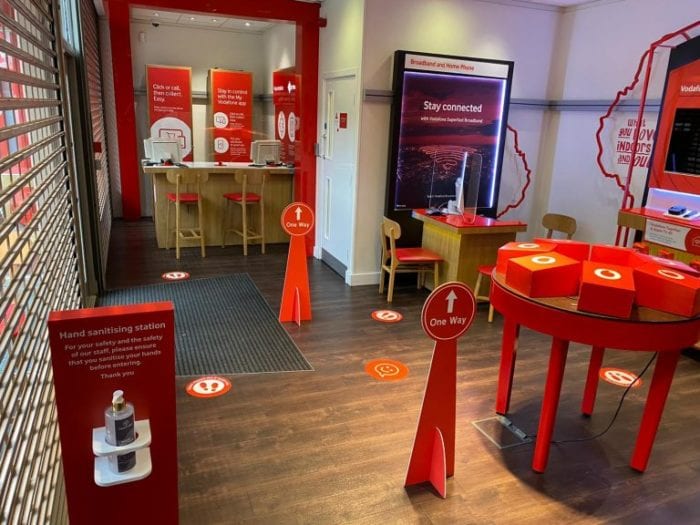 Vodafone stores reopening, but no devices on show.