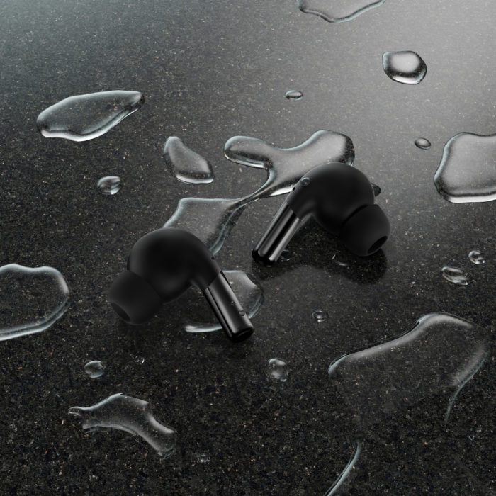 OnePlus Buds Pro black on a wet surface